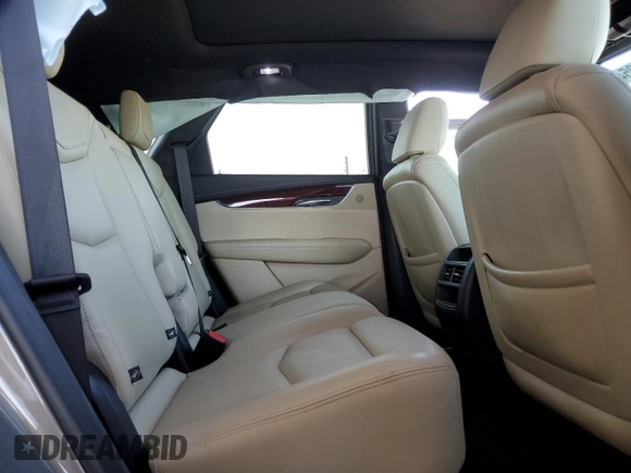 2019 Cadillac XT5 Luxury FWD z VIN 1GYKNCRS4KZ221304, wystawiony jako Copart lot #54995415 z przebiegiem 128 940 mil mil oraz Szkoda całkowita • Salvage title. Historia ofert i sprzedaży dostępna na DreamBid. Obrazek 11.