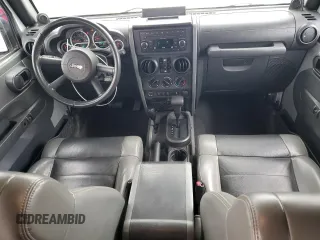 2010 Jeep Wrangler Unlimited Rubicon with VIN 1J4BA6H18AL222429, listed as a Copart auction lot 58348815 with 80,317 mi miles and Salvage title. Bid and sale history available at DreamBid. Image 8.