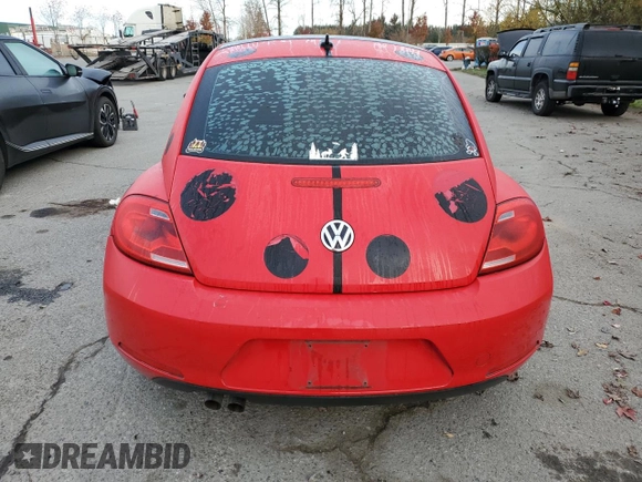 2013 Volkswagen Beetle with VIN 3VWHX7AT8DM604332, listed as a Copart auction lot 79781264 with 125,692 mi miles and Salvage Title. Bid and sale history available at DreamBid. Image 6.