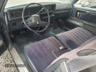 1983 Oldsmobile Cutlass Supreme z VIN 1G3AR47A1DM520447, wystawiony jako Copart lot #58216235 z przebiegiem 88 361 mil mil oraz Szkoda całkowita • Salvage title. Historia ofert i sprzedaży dostępna na DreamBid. Obrazek 8.