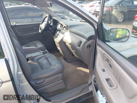 2003 Honda Odyssey EX-L with VIN 5FNRL18913B061340, listed as a IAAI auction lot 42633790 with 1,281,195 mi miles and . Bid and sale history available at DreamBid. Image 5.
