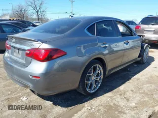 2018 Infiniti Q70 Luxe with VIN JN1BY1AR6JM220065, listed as a IAAI auction lot 41665033 with 135,905 mi miles and . Bid and sale history available at DreamBid. Image 4.