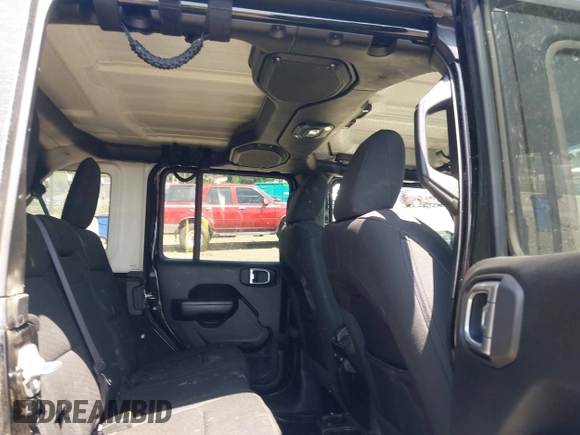 2018 Jeep Wrangler Unlimited Sport S with VIN 1C4HJXDN1JW216825, listed as a IAAI auction lot 42405799 with 37,194 mi miles and . Bid and sale history available at DreamBid. Image 8.