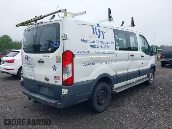 2018 Ford Transit with VIN 1FTYR1ZM1JKB18598, listed as a IAAI auction lot 42533470 with 215,015 mi miles and . Bid and sale history available at DreamBid. Image 4.
