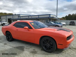 2016 Dodge Challenger SXT Plus with VIN 2C3CDZAG5GH337727, listed as a Copart auction lot 77397604 with 0 mi miles and Salvage Title. Bid and sale history available at carsss.com. Image 4.