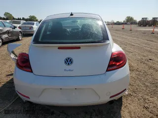 2012 Volkswagen Beetle 2.0T Turbo w/Sun/Sound with VIN 3VWV67AT5CM658403, listed as a Copart auction lot 71611614 with 10,878 mi miles and Salvage Title. Bid and sale history available at carsss.com. Image 6.