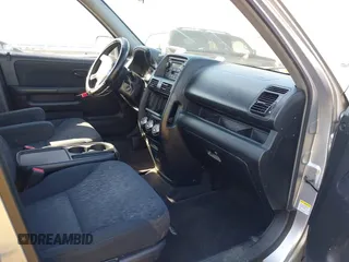 2006 Honda CR-V LX with VIN JHLRD78586C029065, listed as a IAAI auction lot 42043651 with 191,318 mi miles and . Bid and sale history available at carsss.com. Image 5.