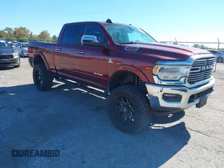 2019 Ram 2500 Laramie with VIN 3C6UR5FL1KG537617, listed as a IAAI auction lot 41076191 with 82,818 mi miles. Bid and sale history available at carsss.com. Image 1.