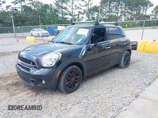 2016 MINI Countryman S z VIN WMWZC3C58GWP53495, wystawiony jako IAAI lot #42134455 z przebiegiem 92 862 mil mil oraz . Historia ofert i sprzedaży dostępna na DreamBid. Obrazek 2.