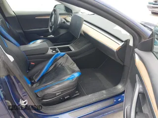 2022 Tesla Model 3 Long Range z VIN 5YJ3E1EB2NF246443, wystawiony jako IAAI lot #42179219 z przebiegiem Nie podano mil oraz . Historia ofert i sprzedaży dostępna na DreamBid. Obrazek 5.