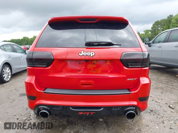 2017 Jeep Grand Cherokee SRT z VIN 1C4RJFDJXHC670370, wystawiony jako IAAI lot #41524965 z przebiegiem 87 276 mil mil oraz . Historia ofert i sprzedaży dostępna na DreamBid. Obrazek 17.