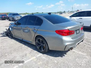 2019 BMW M5 Competition z VIN WBSJF0C50KB285924, wystawiony jako IAAI lot #41686677 z przebiegiem 44 238 mil mil oraz . Historia ofert i sprzedaży dostępna na DreamBid. Obrazek 3.