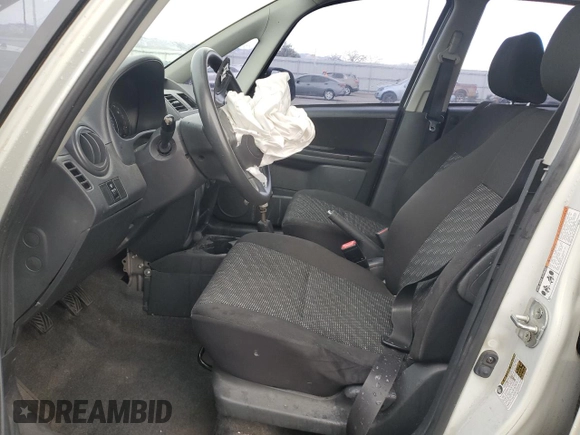 2009 Suzuki SX4 Man AWD with VIN JS2YB413296205039, listed as a Copart auction lot 83799554 with 160,910 mi miles and Salvage Title. Bid and sale history available at carsss.com. Image 7.