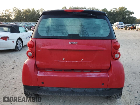 2011 Smart fortwo Pure с VIN WMEEJ3BAXBK421243, выставлен на аукционе Copart как лот 78536584 с пробегом 64 858 миль миль и На запчасти • Non repairable. История ставок и продаж доступна на DreamBid. Изображение 6.