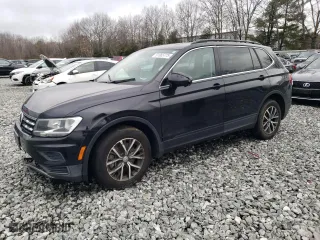 2019 Volkswagen Tiguan SE with VIN 3VV2B7AXXKM068394, listed as a Copart auction lot 51065775 with 87,183 mi miles and Salvage Title. Bid and sale history available at carsss.com. Image 1.