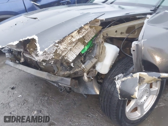 2004 Ford Mustang Standard z VIN 1FAFP40414F105171, wystawiony jako IAAI lot #41754232 z przebiegiem Nie podano mil oraz . Historia ofert i sprzedaży dostępna na DreamBid. Obrazek 6.