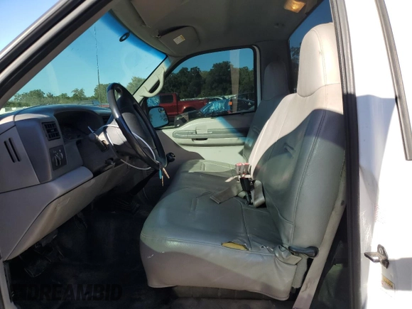 2000 Ford Super Duty F-250 XL with VIN 1FTNF20F9YEC91357, listed as a Copart auction lot 76673234 with 318,306 mi miles and Salvage Title. Bid and sale history available at carsss.com. Image 7.