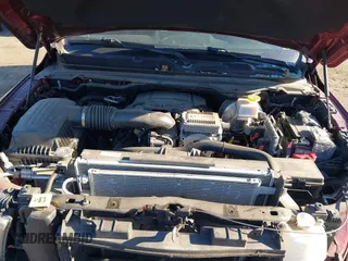 2019 Ram 1500 Big Horn/Lone Star with VIN 1C6SRFFT2KN647936, listed as a IAAI auction lot 41294403 with 123,834 mi miles. Bid and sale history available at carsss.com. Image 10.