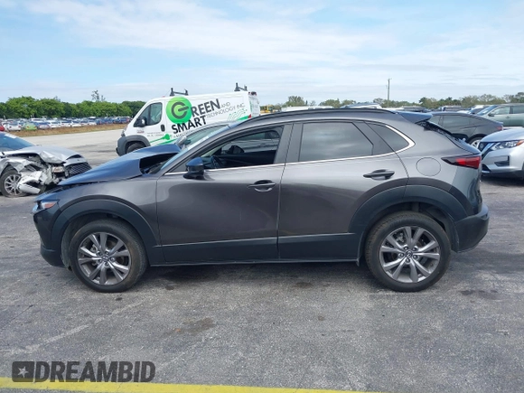 2021 Mazda CX-30 Preferred with VIN 3MVDMACLXMM228431, listed as a IAAI auction lot 41575602 with 67,854 mi miles. Bid and sale history available at carsss.com. Image 14.
