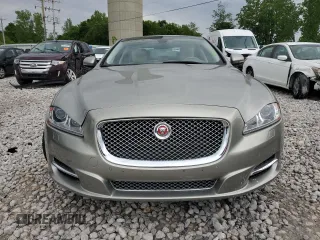 2014 Jaguar XJ z VIN SAJWJ1CD9E8V62338, wystawiony jako Copart lot #58924065 z przebiegiem 60 909 mil mil oraz Czysty tytuł • Clean title. Historia ofert i sprzedaży dostępna na DreamBid. Obrazek 5.