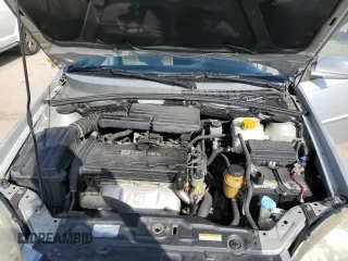 2006 Suzuki Forenza z VIN KL5JD56Z66K299816, wystawiony jako Copart lot #81893914 z przebiegiem 156 416 mil mil oraz Szkoda całkowita • Salvage title. Historia ofert i sprzedaży dostępna na DreamBid. Obrazek 11.