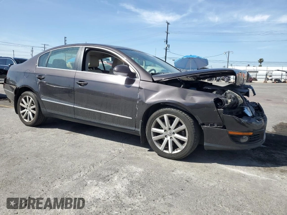 2010 Volkswagen Passat Komfort with VIN WVWJK7ANXAE129739, listed as a Copart auction lot 57798275 with 155,830 mi miles and Salvage title. Bid and sale history available at DreamBid. Image 4.