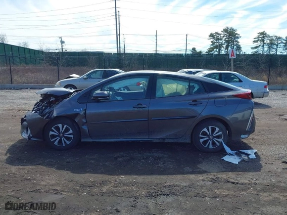 2018 Toyota Prius Prime Plus with VIN JTDKARFP3J3096141, listed as a IAAI auction lot 41822905 with 61,159 mi miles. Bid and sale history available at carsss.com. Image 13.