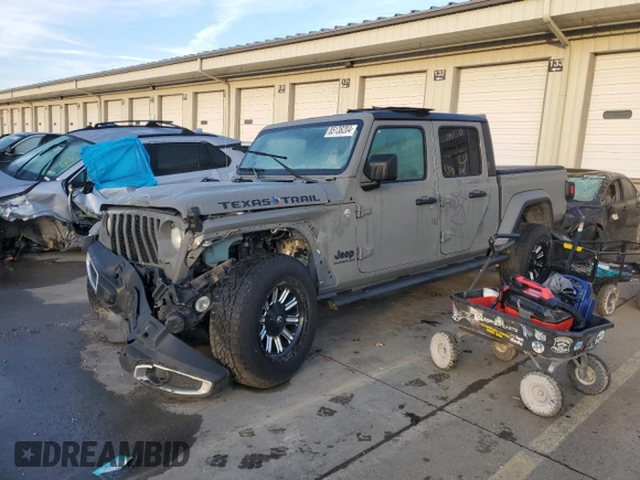 2022 Jeep Gladiator Willys с VIN 1C6HJTAG8NL107002, выставлен на аукционе Copart как лот 85138204 с пробегом 69 166 миль миль и Списание • Salvage title. История ставок и продаж доступна на DreamBid. Изображение 1.