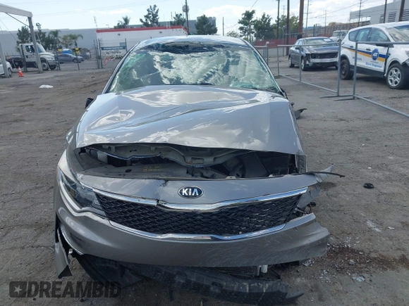 2018 Kia Optima LX z VIN 5XXGT4L38JG228380, wystawiony jako IAAI lot #41960308 z przebiegiem 43 317 mil mil oraz . Historia ofert i sprzedaży dostępna na DreamBid. Obrazek 12.