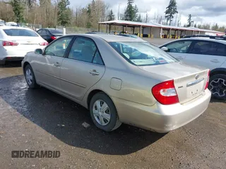 2004 Toyota Camry LE with VIN JTDBE32K440272373, listed as a IAAI auction lot 41949768 with 205,093 mi miles. Bid and sale history available at carsss.com. Image 3.