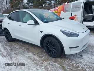 2023 Tesla Model Y Long Range with VIN 7SAYGAEE8PF706706, listed as a IAAI auction lot 41297340 with 24,428 mi miles and . Bid and sale history available at DreamBid. Image 1.