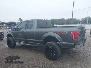 2015 Ford F-150 XLT z VIN 1FTFX1EG2FFA85236, wystawiony jako IAAI lot #41401898 z przebiegiem 170 730 mil mil oraz . Historia ofert i sprzedaży dostępna na DreamBid. Obrazek 14.