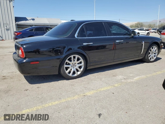 2009 Jaguar XJ 8 with VIN SAJWA71B79SH30431, listed as a Copart auction lot 52403185 with 67,143 mi miles and Salvage Title. Bid and sale history available at DreamBid. Image 3.