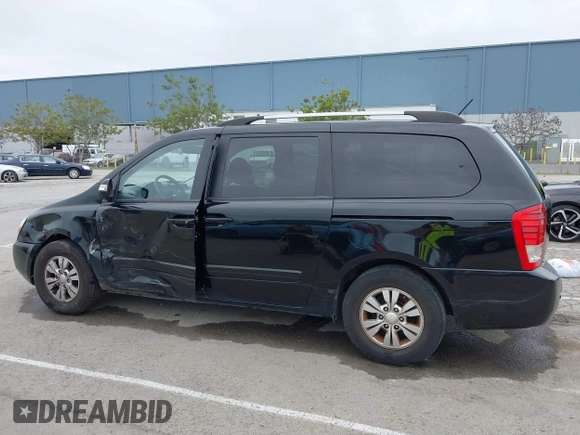 2012 Kia Sedona LX with VIN KNDMG4C78C6502141, listed as a IAAI auction lot 41725800 with 153,789 mi miles and . Bid and sale history available at carsss.com. Image 13.