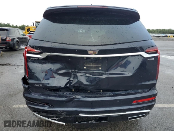 2022 Cadillac XT6 Premium Luxury with VIN 1GYKPDRS1NZ118166, listed as a Copart auction lot 67482984 with 24,980 mi miles and Salvage Title. Bid and sale history available at carsss.com. Image 6.
