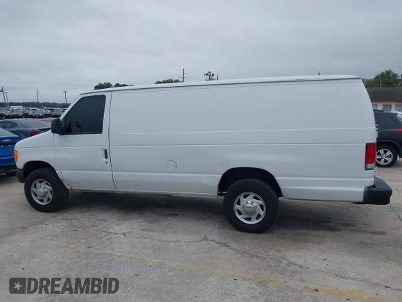 2002 Ford Econoline Cargo with VIN 1FTSS34L62HA53783, listed as a IAAI auction lot 41403058 with 306,576 mi miles and . Bid and sale history available at DreamBid. Image 14.