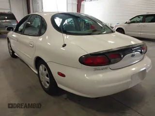1998 Ford Taurus z VIN 1FAFP52S1WA120013, wystawiony jako IAAI lot #41987332 z przebiegiem 179 500 mil mil oraz . Historia ofert i sprzedaży dostępna na DreamBid. Obrazek 3.
