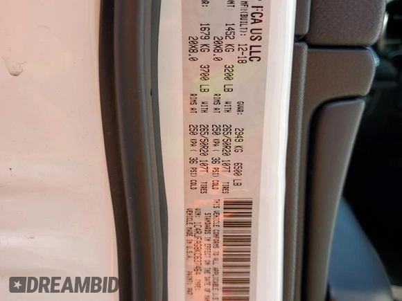 2019 Jeep Grand Cherokee Laredo E with VIN 1C4RJFAG8KC637464, listed as a Copart auction lot 60451115 with 102,105 mi miles and Salvage title. Bid and sale history available at DreamBid. Image 14.