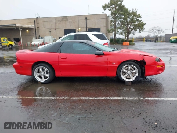 1999 Chevrolet Camaro Z28 z VIN 2G1FP22G2X2112215, wystawiony jako IAAI lot #41459474 z przebiegiem 106 832 mil mil oraz . Historia ofert i sprzedaży dostępna na DreamBid. Obrazek 13.