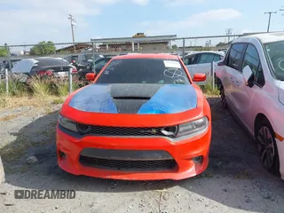 2020 Dodge Charger Scat Pack z VIN 2C3CDXGJ1LH221572, wystawiony jako IAAI lot #41286078 z przebiegiem 67 514 mil mil oraz . Historia ofert i sprzedaży dostępna na DreamBid. Obrazek 12.