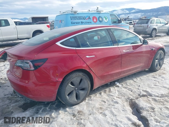 2018 Tesla Model 3 Long Range Battery with VIN 5YJ3E1EB0JF064041, listed as a IAAI auction lot 41562239 with 54,720 mi miles and . Bid and sale history available at DreamBid. Image 4.