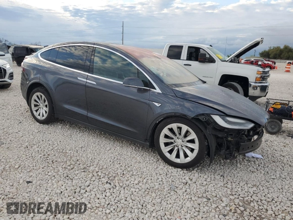 2016 Tesla Model X 70D with VIN 5YJXCAE22GF002253, listed as a Copart auction lot 50700425 with 153,258 mi miles and Salvage Title. Bid and sale history available at carsss.com. Image 4.