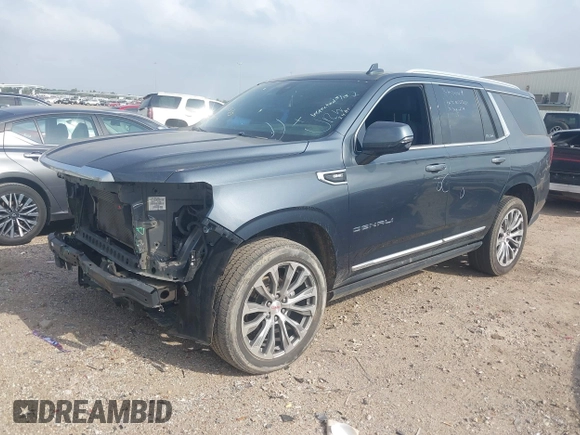 2021 GMC Yukon Denali with VIN 1GKS2DKL4MR392195, listed as a IAAI auction lot 41961535 with 90,499 mi miles. Bid and sale history available at carsss.com. Image 2.