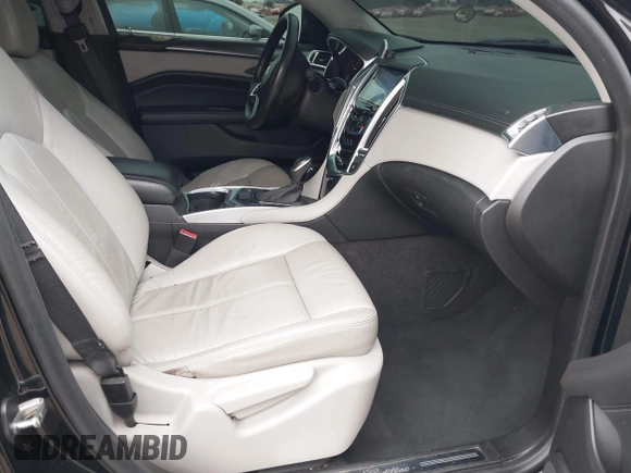 2015 Cadillac SRX with VIN 3GYFNAE37FS598023, listed as a IAAI auction lot 41198546 with 127,373 mi miles and . Bid and sale history available at carsss.com. Image 5.