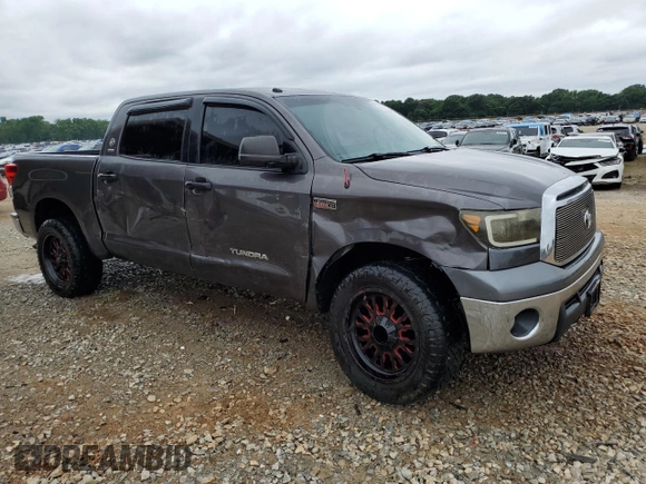 2012 Toyota Tundra with VIN 5TFDW5F1XCX264609, listed as a Copart auction lot 55804585 with 224,662 mi miles and Salvage title. Bid and sale history available at DreamBid. Image 4.