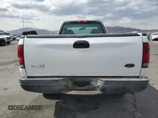 2004 Ford F-150 XL with VIN 2FTRF17294CA59985, listed as a Copart auction lot 55296195 with 220,933 mi miles and Salvage title. Bid and sale history available at DreamBid. Image 6.