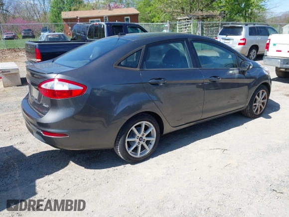 2015 Ford Fiesta SE with VIN 3FADP4BJ6FM105731, listed as a IAAI auction lot 41994903 with 150,189 mi miles. Bid and sale history available at carsss.com. Image 4.