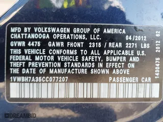 2012 Volkswagen Passat SE w/Sunroof with VIN 1VWBH7A35CC077207, listed as a IAAI auction lot 41351317 with 136,904 mi miles. Bid and sale history available at carsss.com. Image 9.