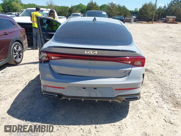 2022 Kia K5 GT-Line z VIN 5XXG64J23NG156401, wystawiony jako IAAI lot #42051123 z przebiegiem 71 853 mil mil oraz . Historia ofert i sprzedaży dostępna na DreamBid. Obrazek 16.