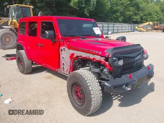 2022 Jeep Wrangler Unlimited Rubicon with VIN 1C4HJXFG0NW100620, listed as a IAAI auction lot 42534993 with 21,614 mi miles and . Bid and sale history available at DreamBid. Image 1.